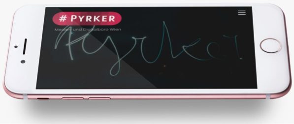 Mockup of an iPhone in landscape with Pyrker logo Mockup of an iPhone in landscape with Pyrker logo